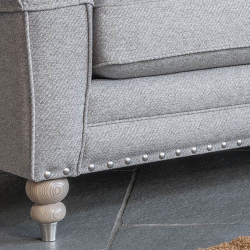 Gray sofa with silver studs deals